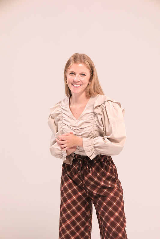 Blusa con volantes y frunces