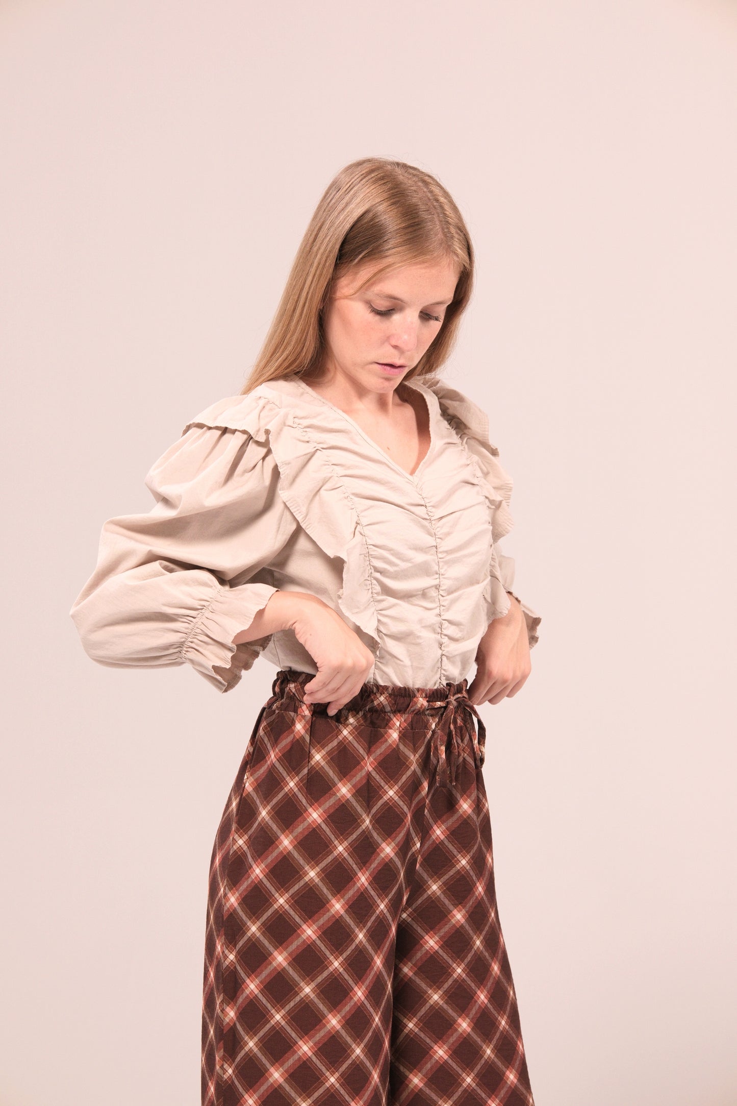 Blusa con volantes y frunces