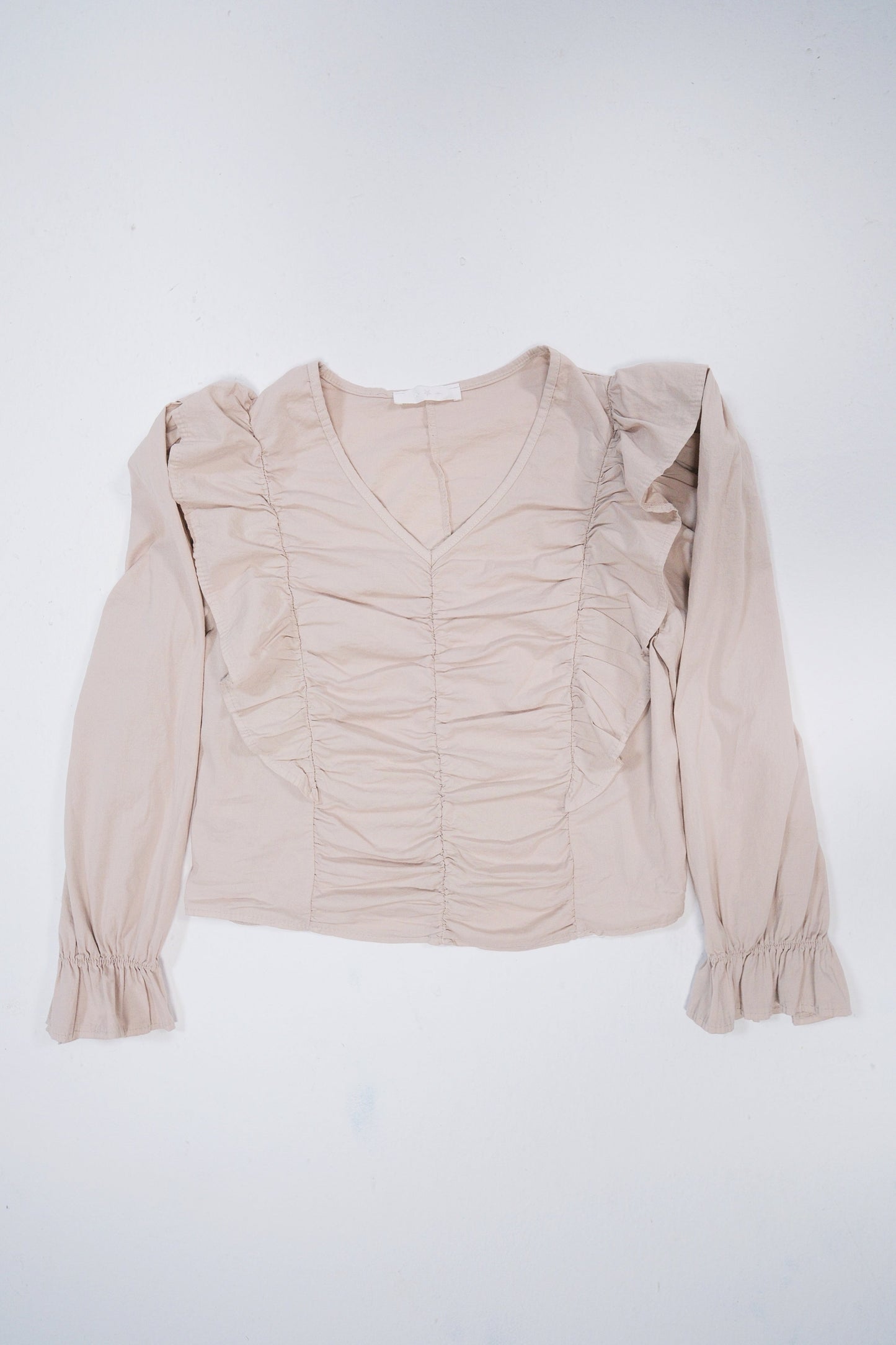 Blusa con volantes y frunces